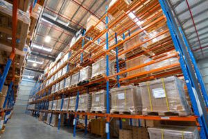 blue and orange pallet racking in warehouse